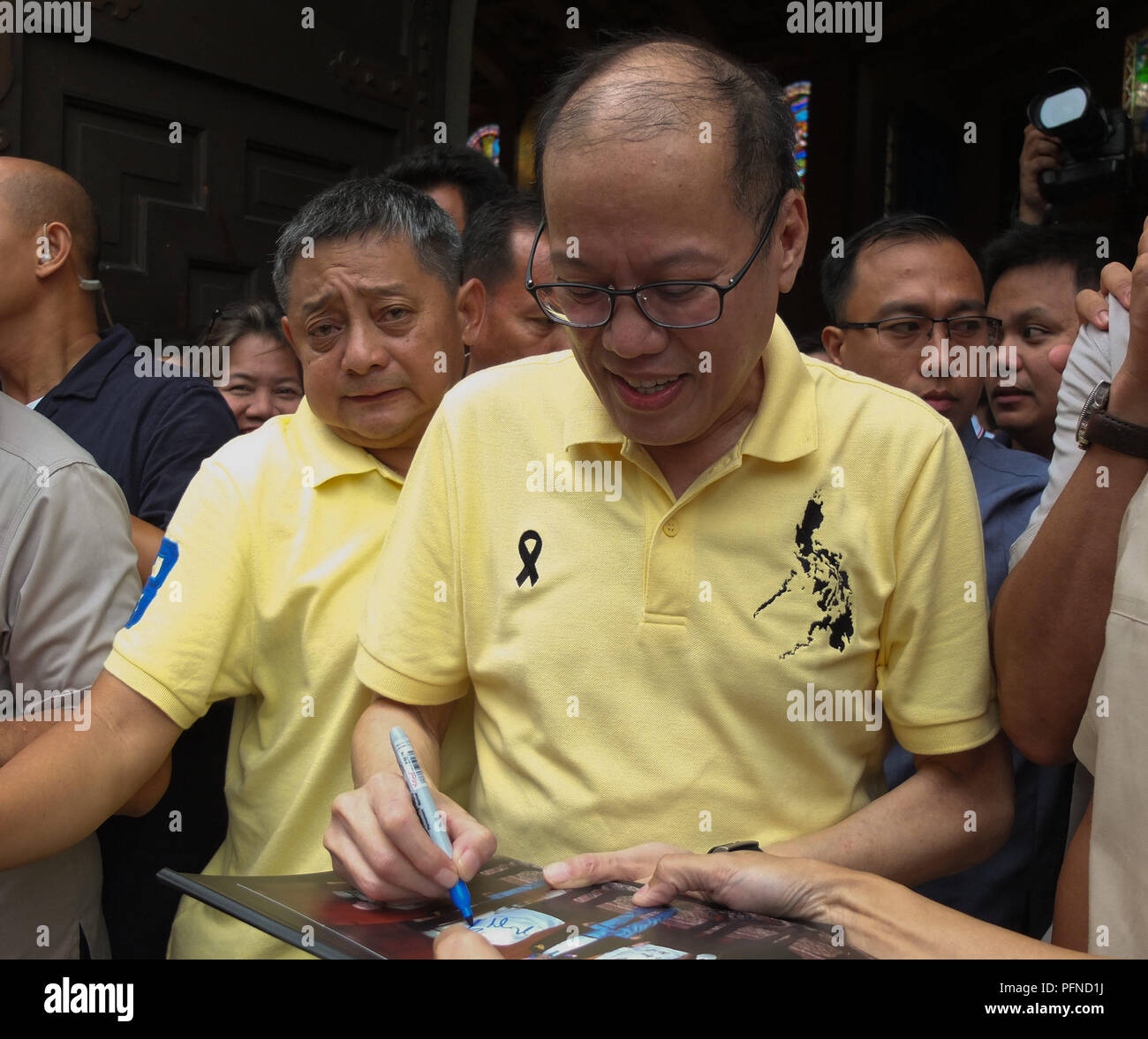 Quezon City Philippines 1st Feb 2013 Former Philippine President Benigno Noynoy Aquino Seen Making An Autograph For A Supporter A Church Mass Commemorating The 35th Year Anniversary Of The Assassination Of Benigno Ninoy