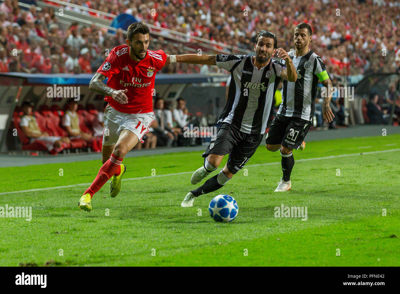 Lisbon, Portugal. August 21, 2018. Benfica's forward from Argentina Facundo  Ferreyra (19) and PAOK's defender from Spain Jose Angel Crespo (15) during  the game of the 1st leg of the Playoffs of