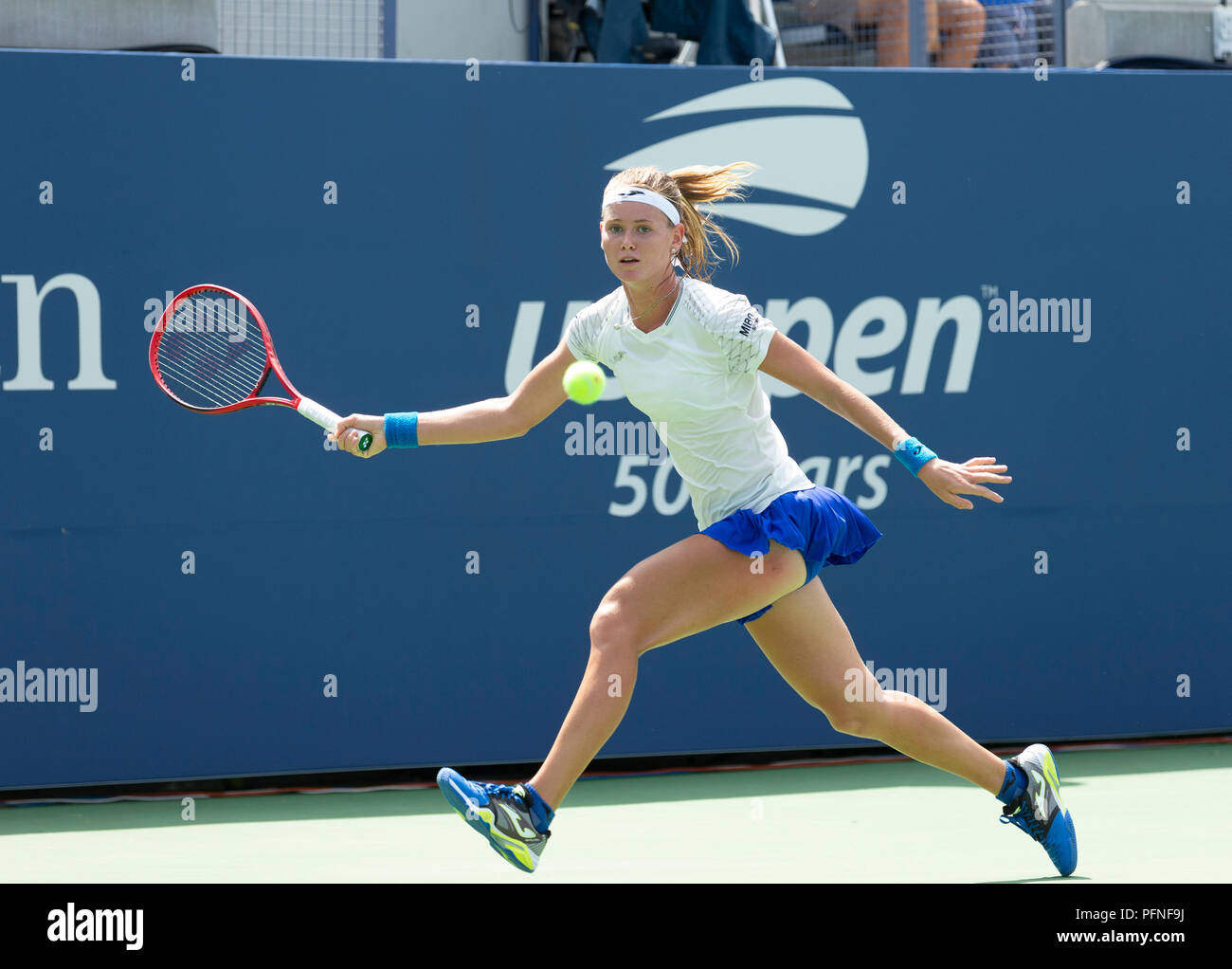 New York, NY - August 21, 2018: Marie Bouzkova of Czech Republic returns  ball during qualifying day 1 against Ann Li of USA at US Open Tennis  championship at USTA Billie Jean