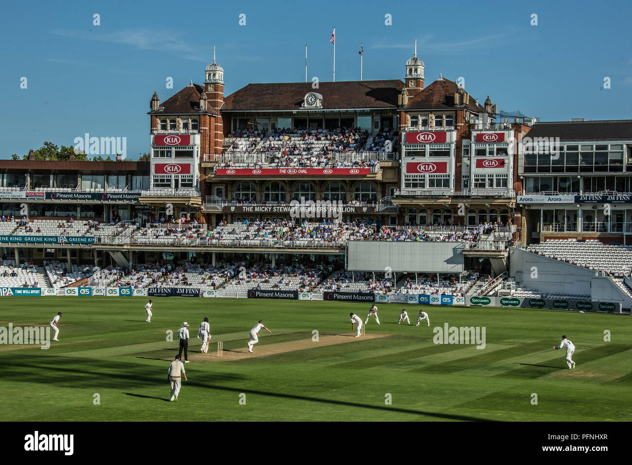 London, UK. 21 August 2018. A view of the Oval with the Micky Stewart members pavilion in the background on a sunny afternoon as Surrey take on Lancashire on day three of the Specsavers County Championship day/night game at the Oval with a pink ball. David Rowe/Alamy Live News Stock Photo