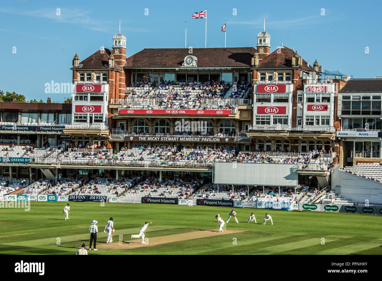 London, UK. 21 August 2018. A view of the Oval with the Micky Stewart members pavilion in the background on a sunny afternoon as Surrey take on Lancashire on day three of the Specsavers County Championship day/night game at the Oval with a pink ball. David Rowe/Alamy Live News Stock Photo