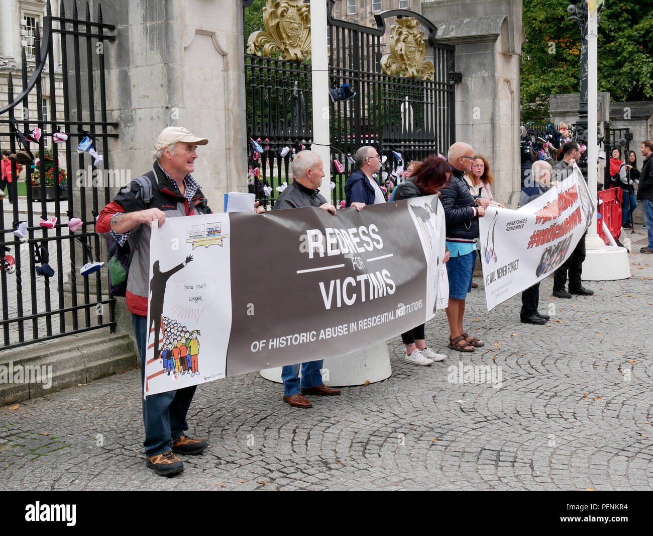 Belfast, Northern Ireland, UK. 22 August 2018. Survivors and Victims of Clerical and Institutional Abuse (SAVIA) held a protest at Belfast City Hall calling for an apology from the Vatican for historical child abuse. The group was joined by other victims and survivors. Pope Francis will visit Ireland over 25th and 26th August but will not visit Northern Ireland. Credit J Orr/Alamy Live News Stock Photo
