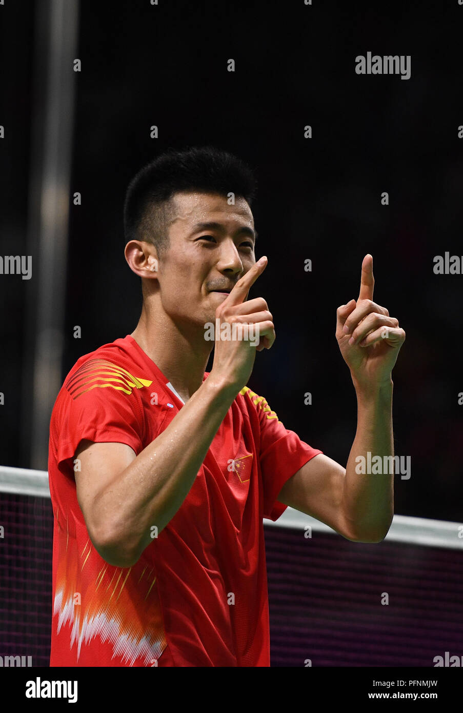 Jakarta. 22nd Aug, 2018. China's Chen Long celebrates during the double ...