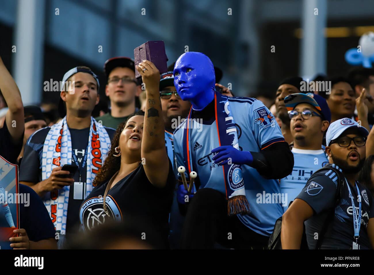 Bronx, NY, USA. 22nd August, 2018. The Blue Man Group joins the Third Rail and NYCFC fans at the NYCFC vs New York Redbulls derby. © Ben Nichols/Alamy Live News. Stock Photo