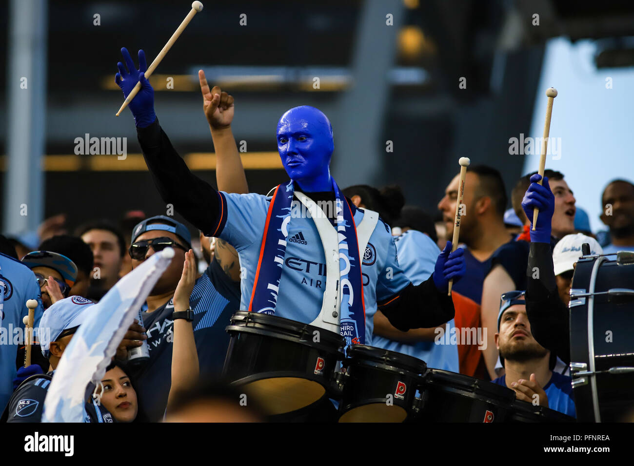 Bronx, NY, USA. 22nd August, 2018. The Blue Man Group joins the Third Rail and NYCFC fans at the NYCFC vs New York Redbulls derby. © Ben Nichols/Alamy Live News. Stock Photo