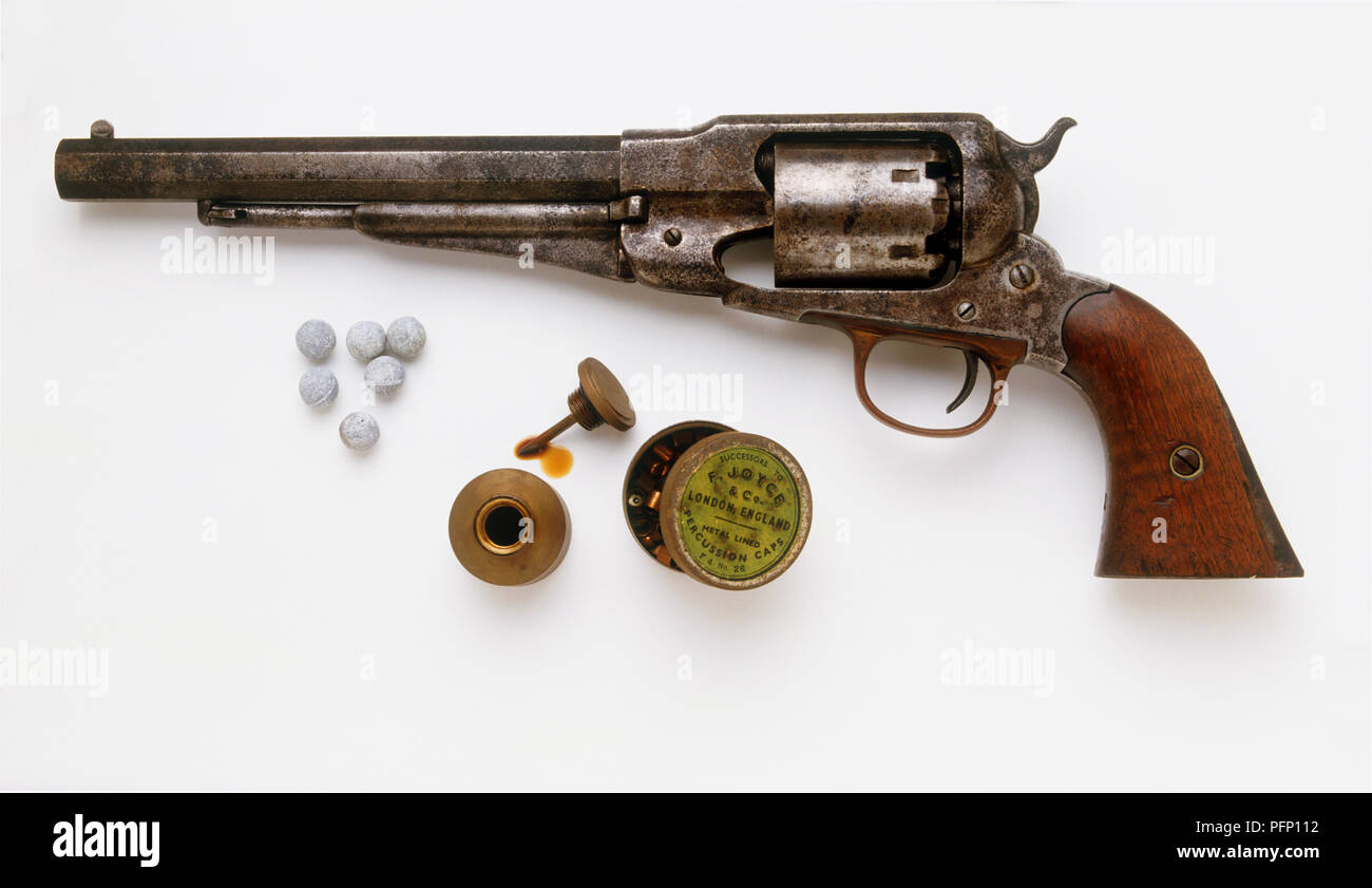 Long Colt pocket pistol, 1849, bullets for Remington New Model Army .44 percussion revolver, metal vial and lid for gun oil, tin percussion caps Stock Photo