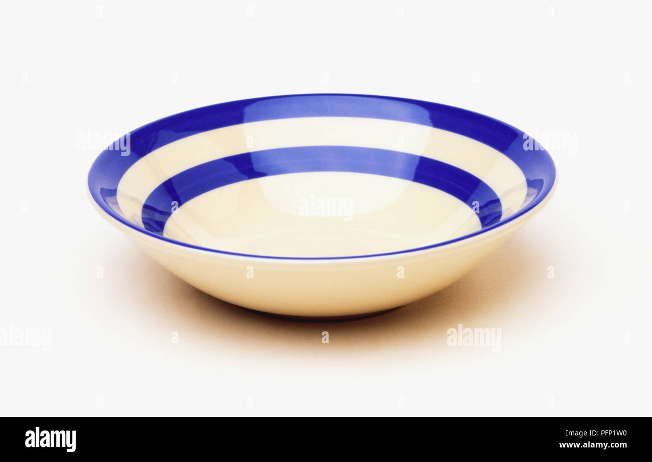 Blue and white striped bowl Stock Photo Alamy