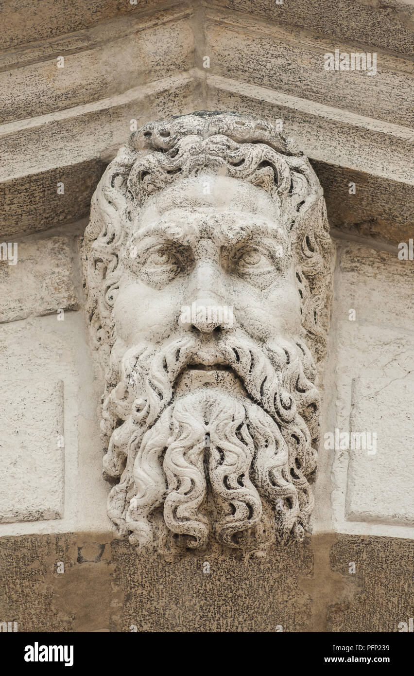 Bearded man white stone head at the top of Rialto Bridge in Venice (16th century) Stock Photo