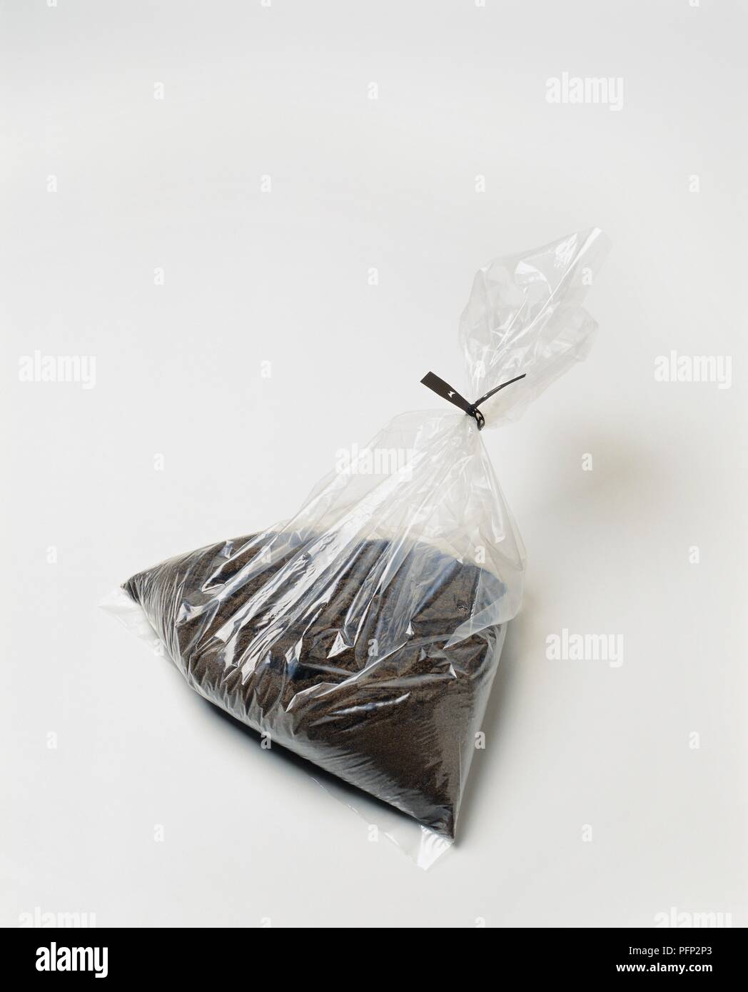 Smooth soil in clear plasic bag Stock Photo