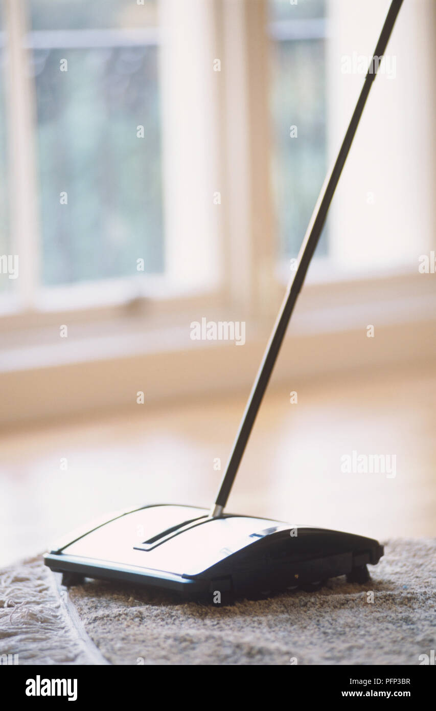 Hand-operated carpet sweeper Stock Photo
