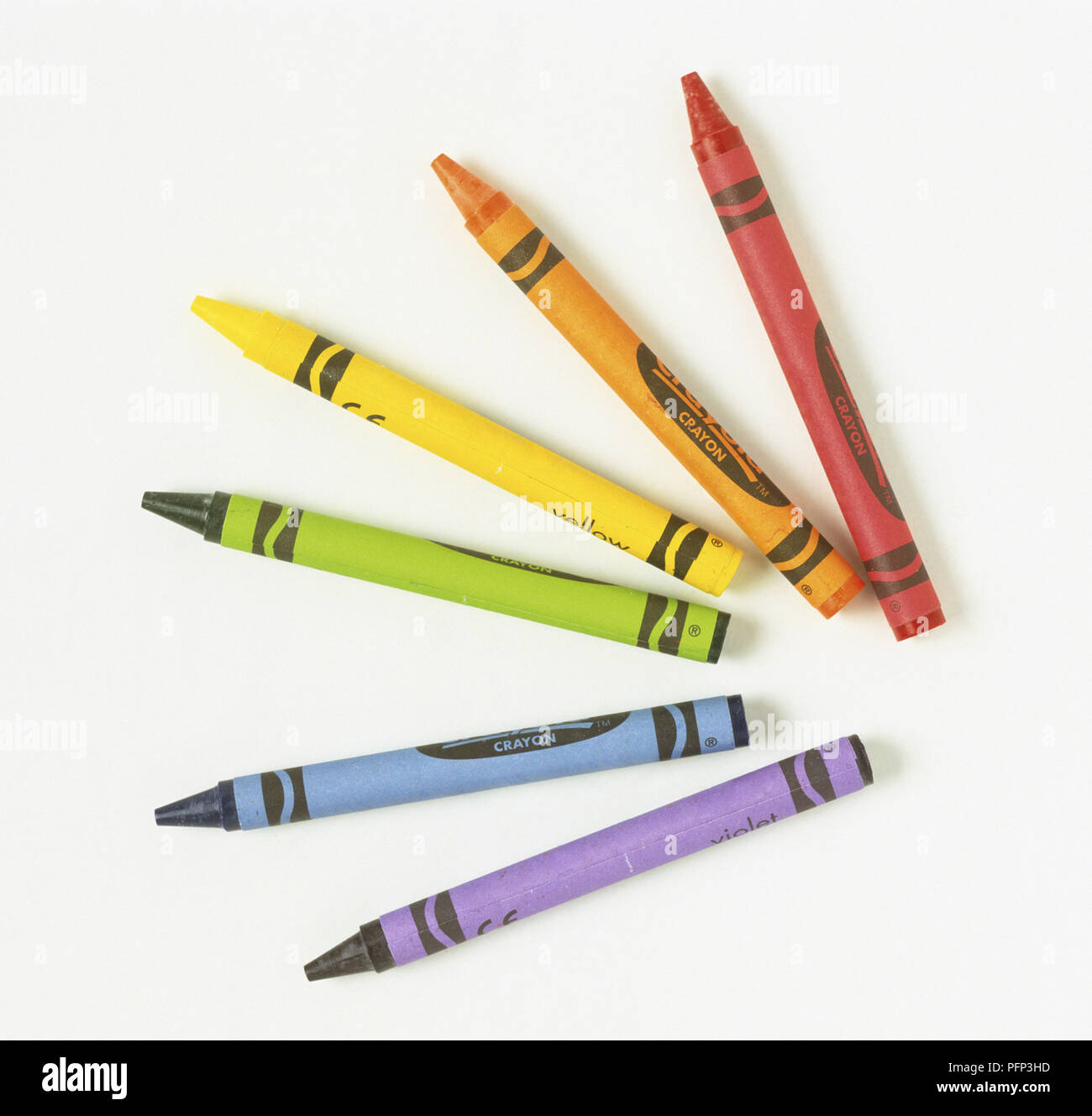 Six different coloured crayons Stock Photo