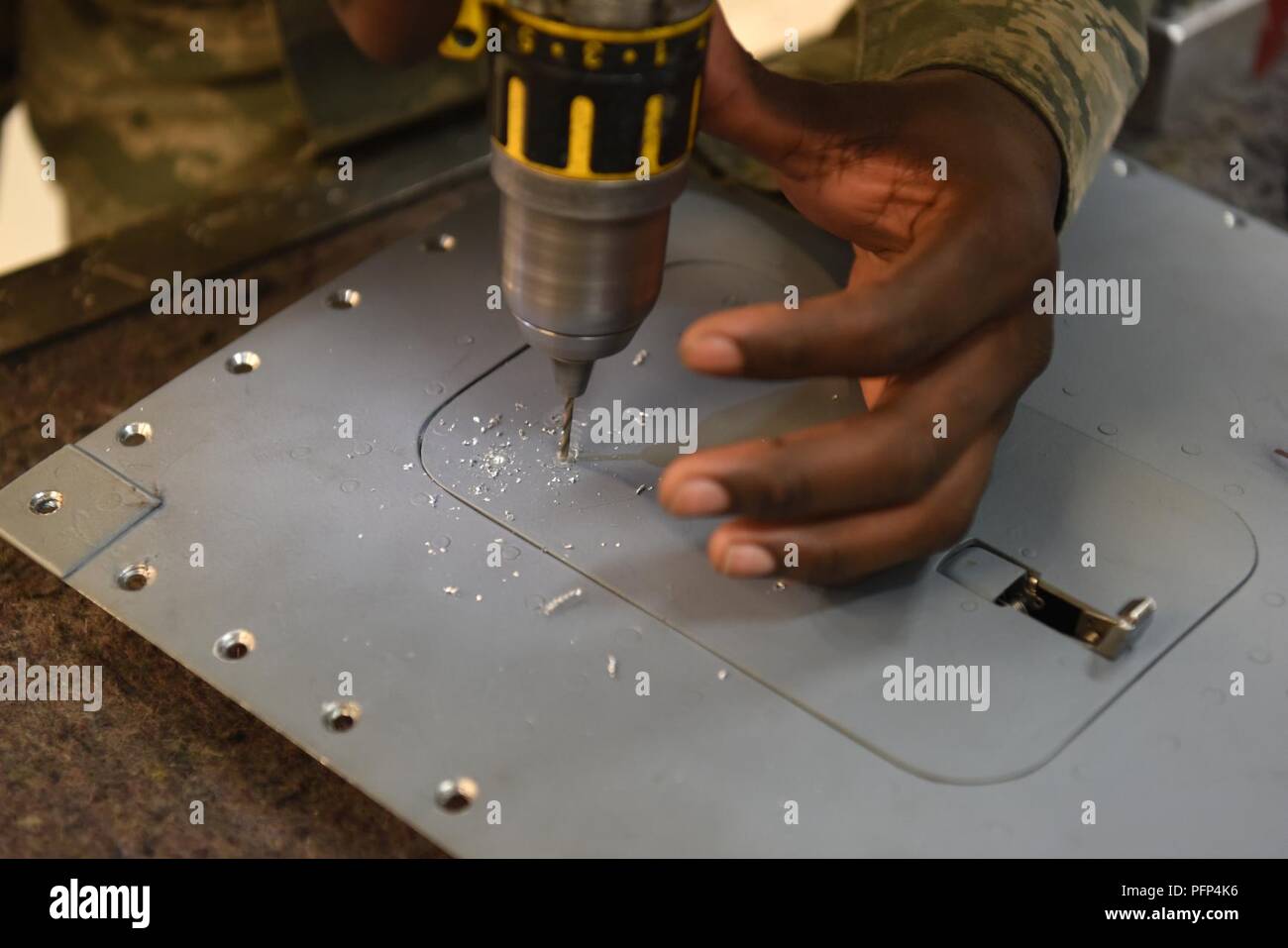 a-48th-aircraft-structural-maintenance-airman-drills-out-a-rivet-to