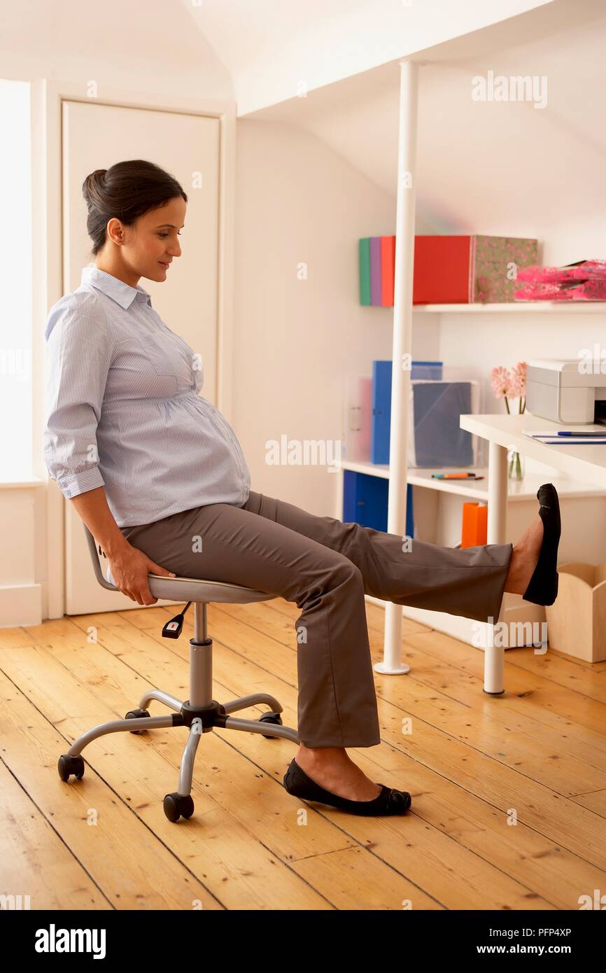 Woman sitting chair full length hi-res stock photography and images - Alamy