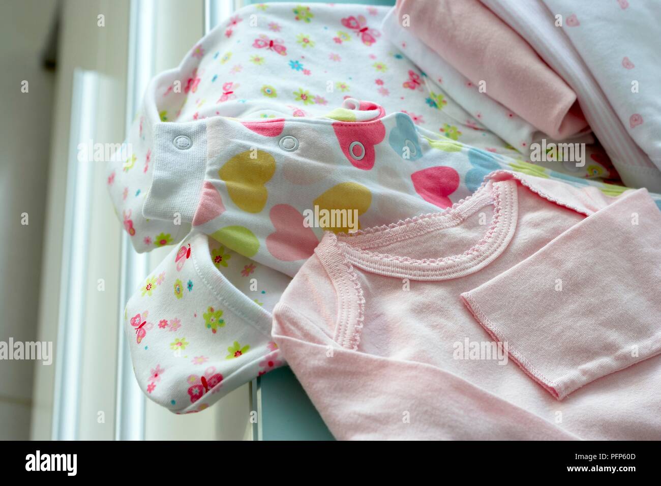 Baby Clothing On Chest Of Drawers Stock Photo 216231917 Alamy