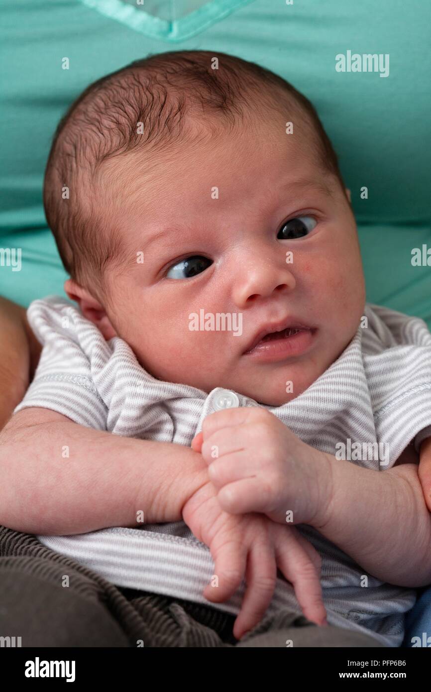 Newborn Baby With Squint Front View Stock Photo 216232218 Alamy