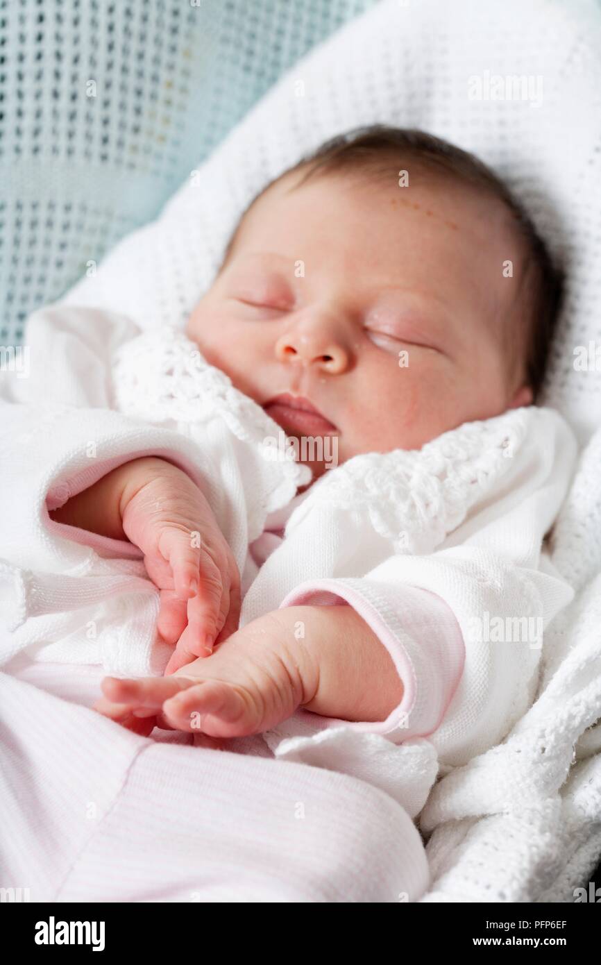 Baby girl lying on baby blanket hi-res stock photography and images - Alamy