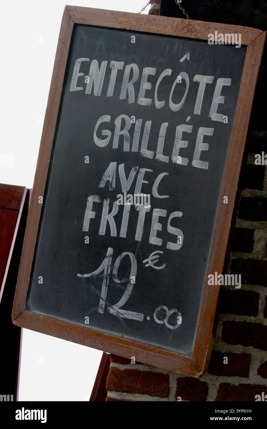 France, sign for steak and chips in French on blackboard Stock Photo