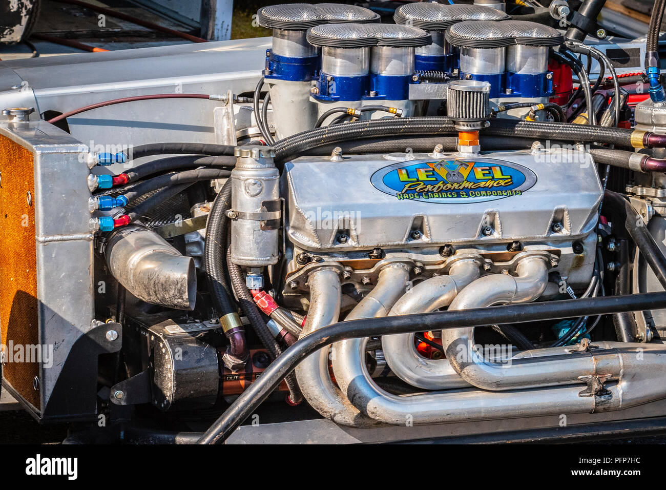 A look at a 470 cubic inch, 900+ horsepower methanol fueled engine mounted on the left side of an ISMA racecar at Monadnock Speedway in Winchester, NH Stock Photo