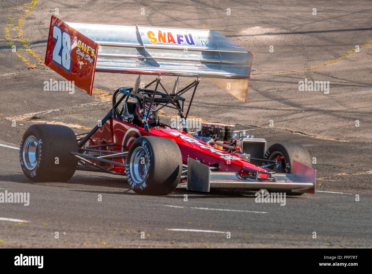 Owner/driver Eric Lewis, of Syracuse, NY, pilots his ISMA supermodified racecar at Monadnock Speedway in Winchester, NH,on June 30, 2018. Stock Photo