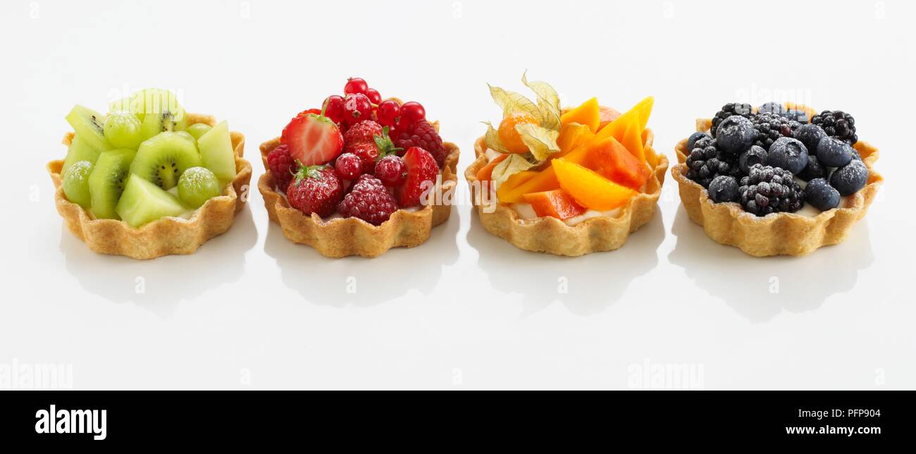 Small fruit tarts in baked pastry shells Stock Photo Alamy