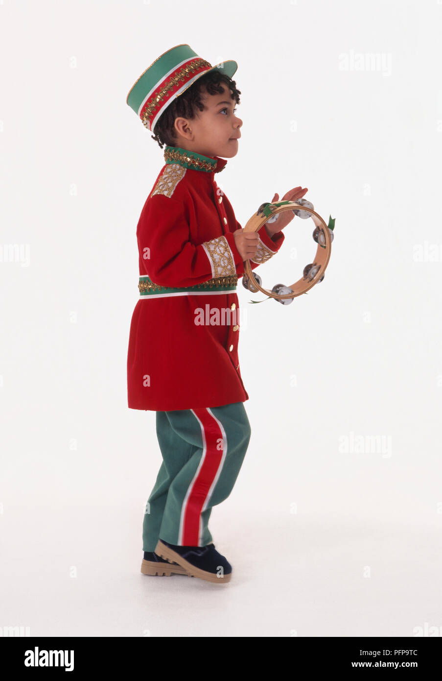 Playing tambourine hires stock photography and images Alamy