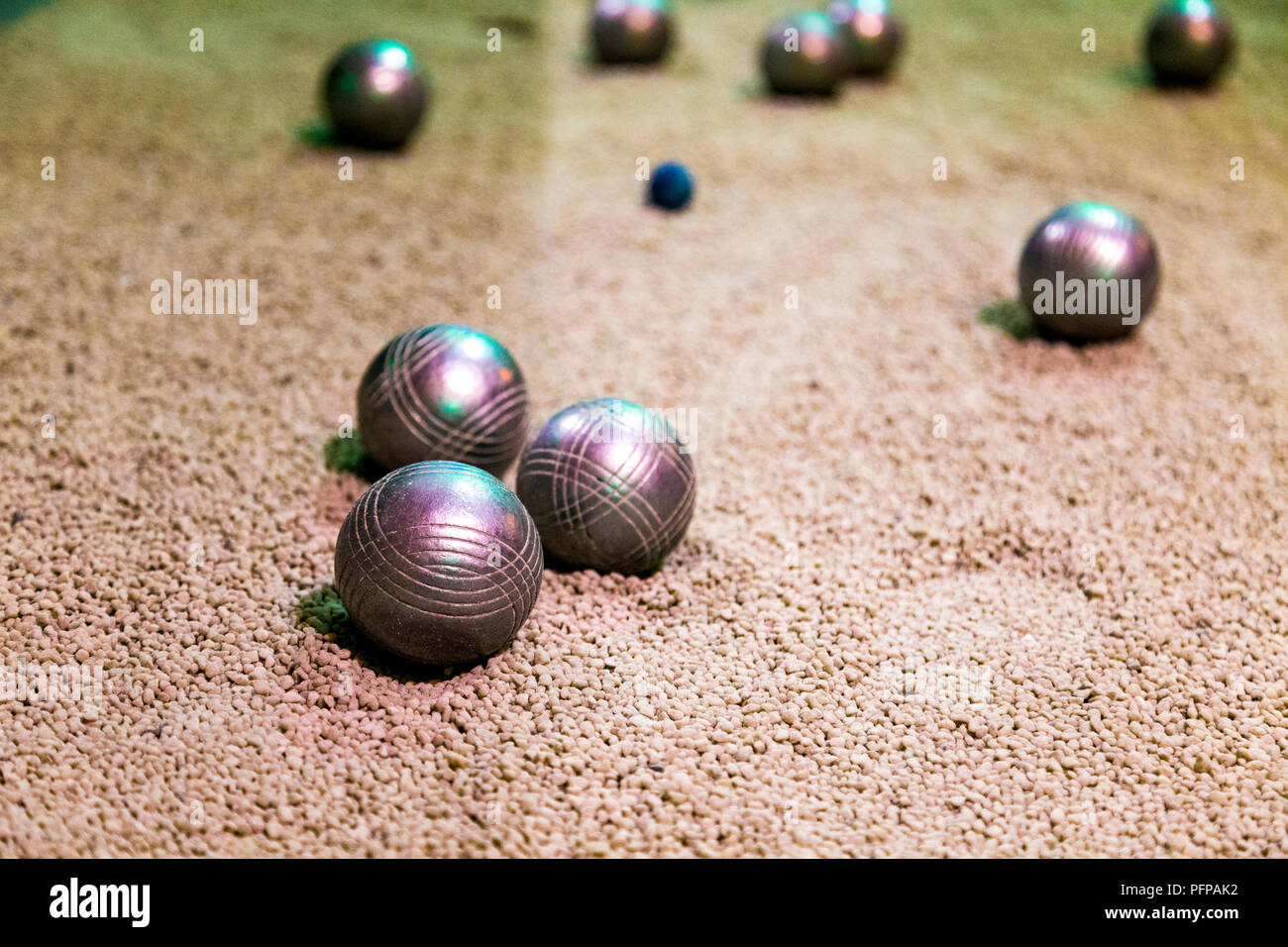 Metal boule balls on gravel boule court Stock Photo