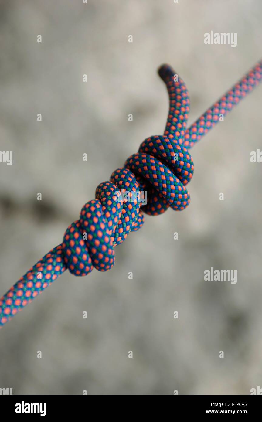 Knotted climbing rope Stock Photo - Alamy