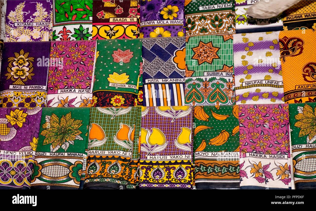 Kenya, Mombasa, Biashara Street, colourful traditional garments (kangas) for sale Stock Photo