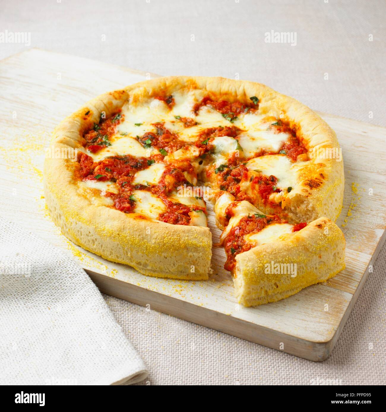 Chicagosyle thick crust pizza Stock Photo Alamy