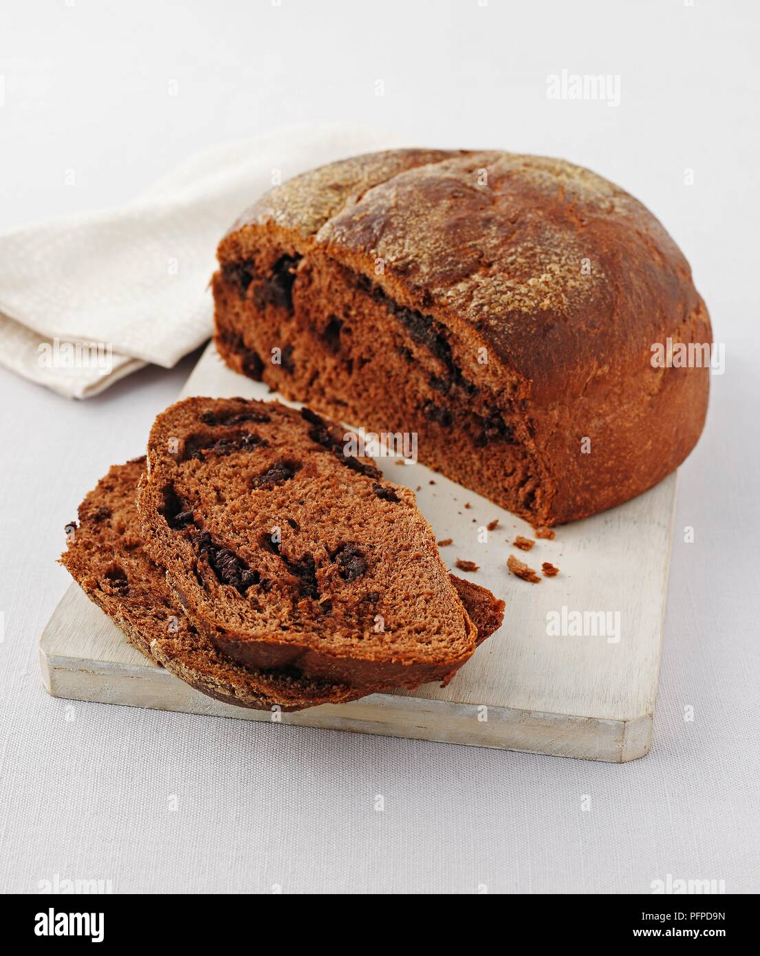 Chocolate bread with a couple of slices cut off from the loaf Stock Photo