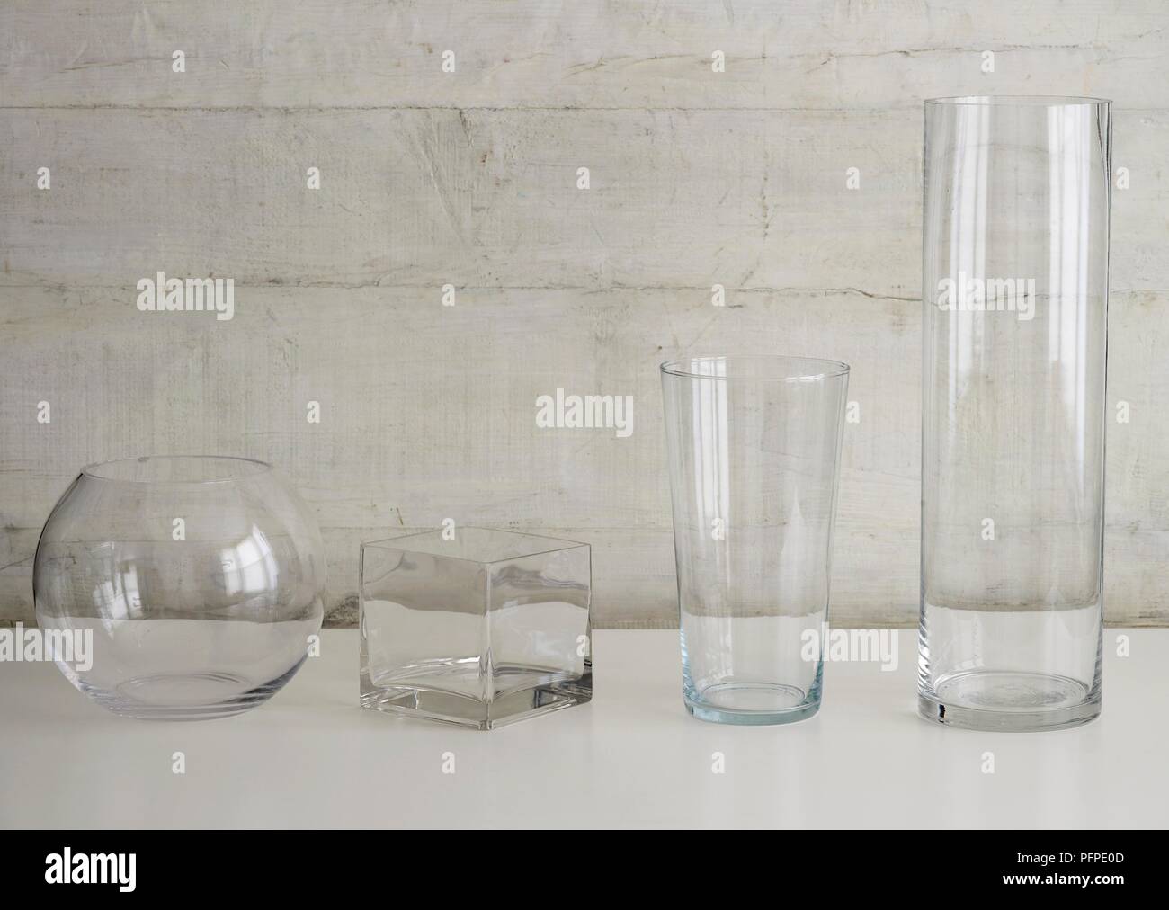 A selection of glass vases of different shapes Stock Photo