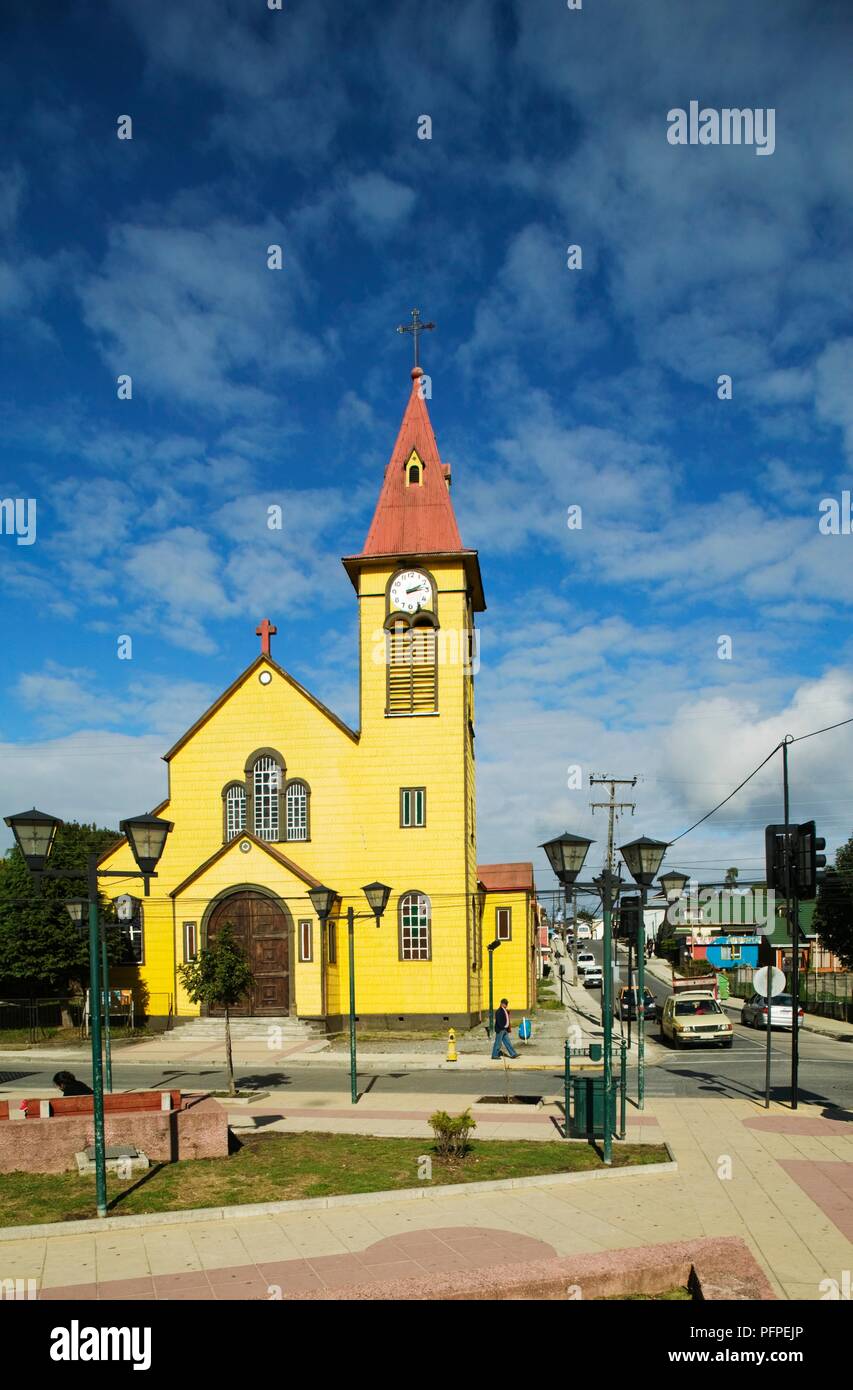 Chile, Los Lagos Region, Calbuco Island, Calbuco city, Iglesia de San Miguel, yellow church exterior Stock Photo