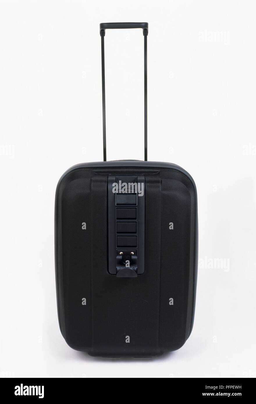 Black suitcase on wheels with handle Stock Photo Alamy