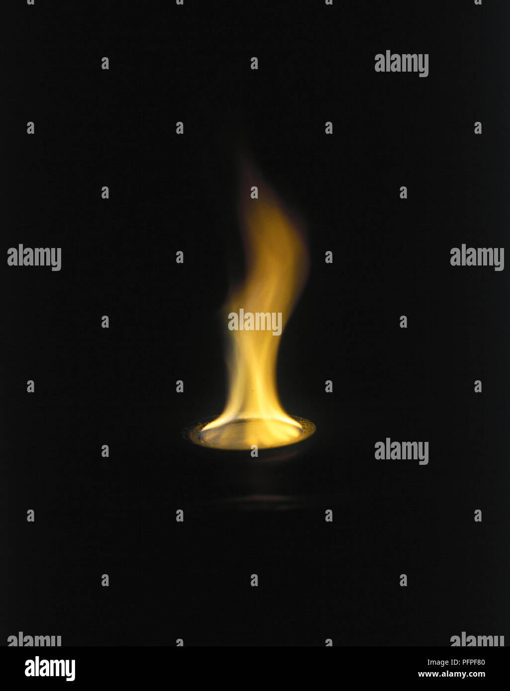 Golden yellow flame, Sodium salts burning Stock Photo Alamy