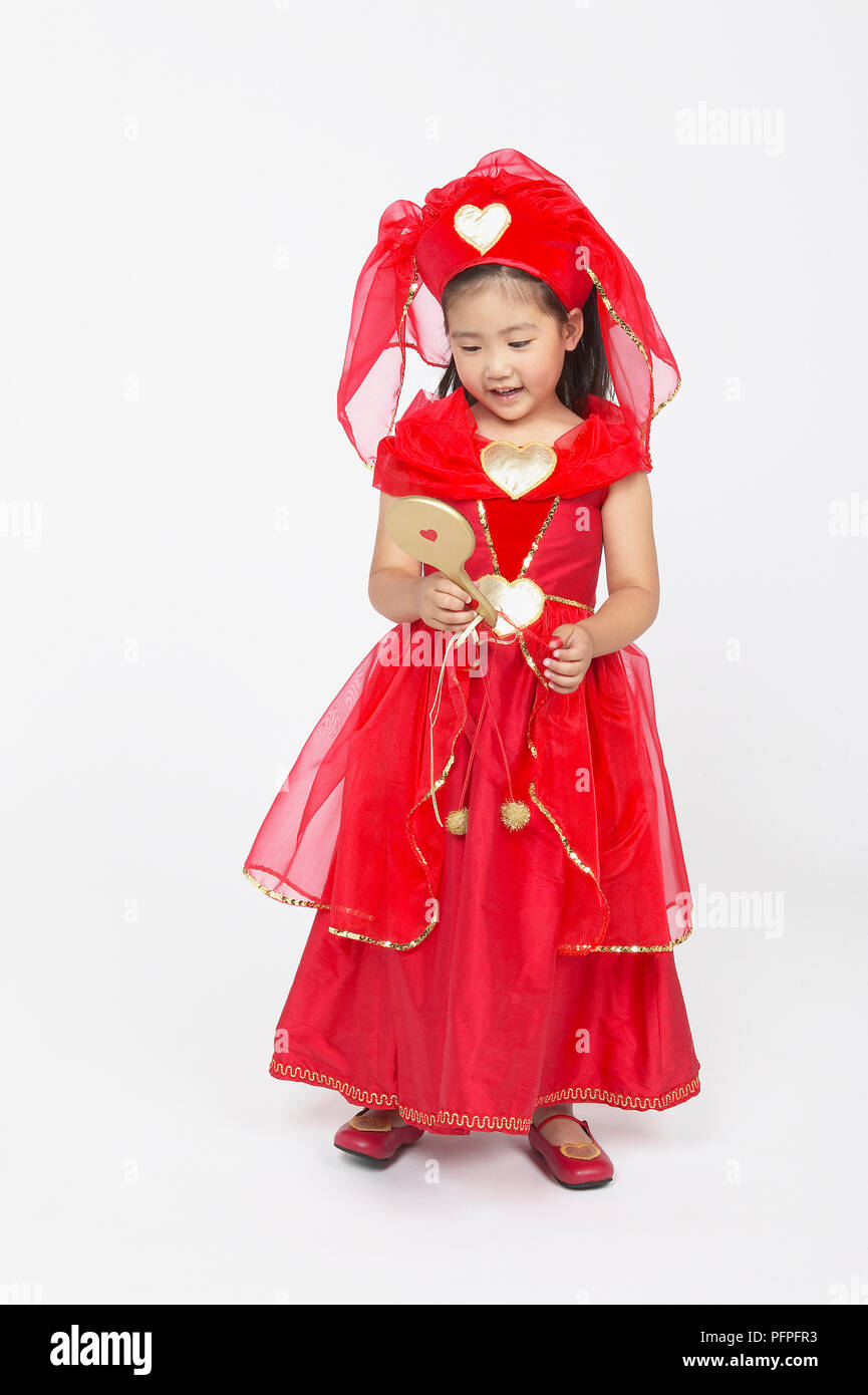 Girl in red princess dress and red headdress holding gold hand-held mirror  Stock Photo - Alamy