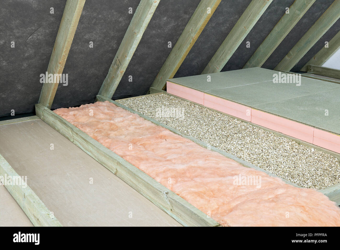 Ceiling joists, insulation, and loosefill in loft space Stock Photo Alamy