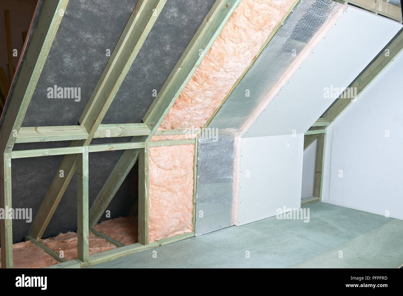 Blanket insulation, framefoil and thermal-check plasterboard Stock Photo