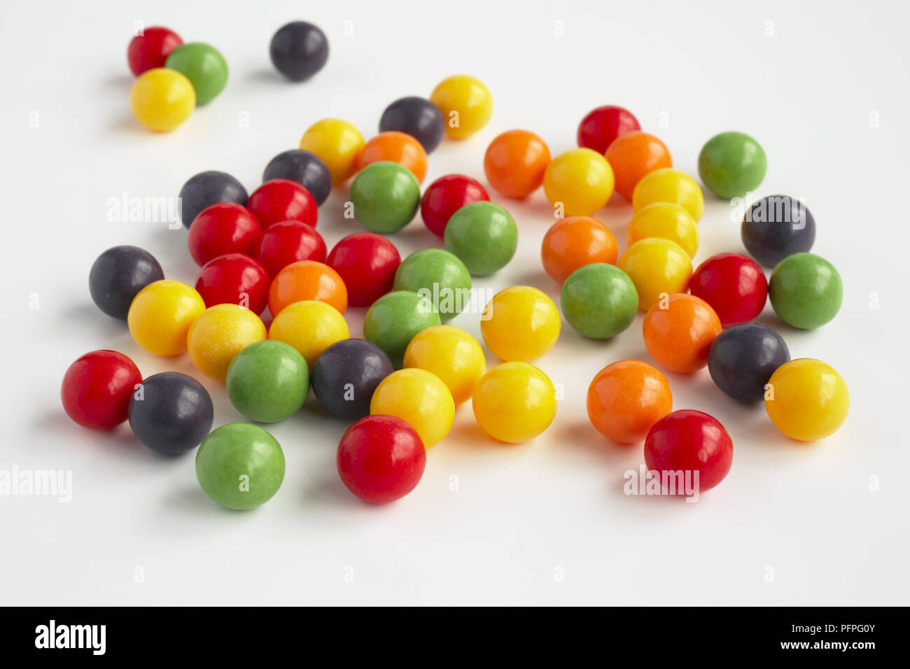 Round coloured sweets hi-res stock photography and images - Alamy