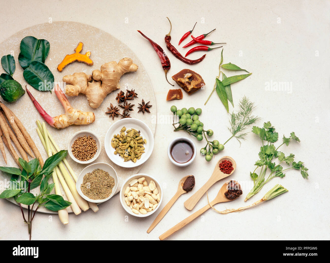 https://c8.alamy.com/comp/PFPGW6/selection-of-ingredients-typical-for-south-east-asian-cuisine-spices-seeds-herbs-including-ginger-galangal-lemon-grass-thai-basil-pea-aubergines-chilli-peppers-PFPGW6.jpg