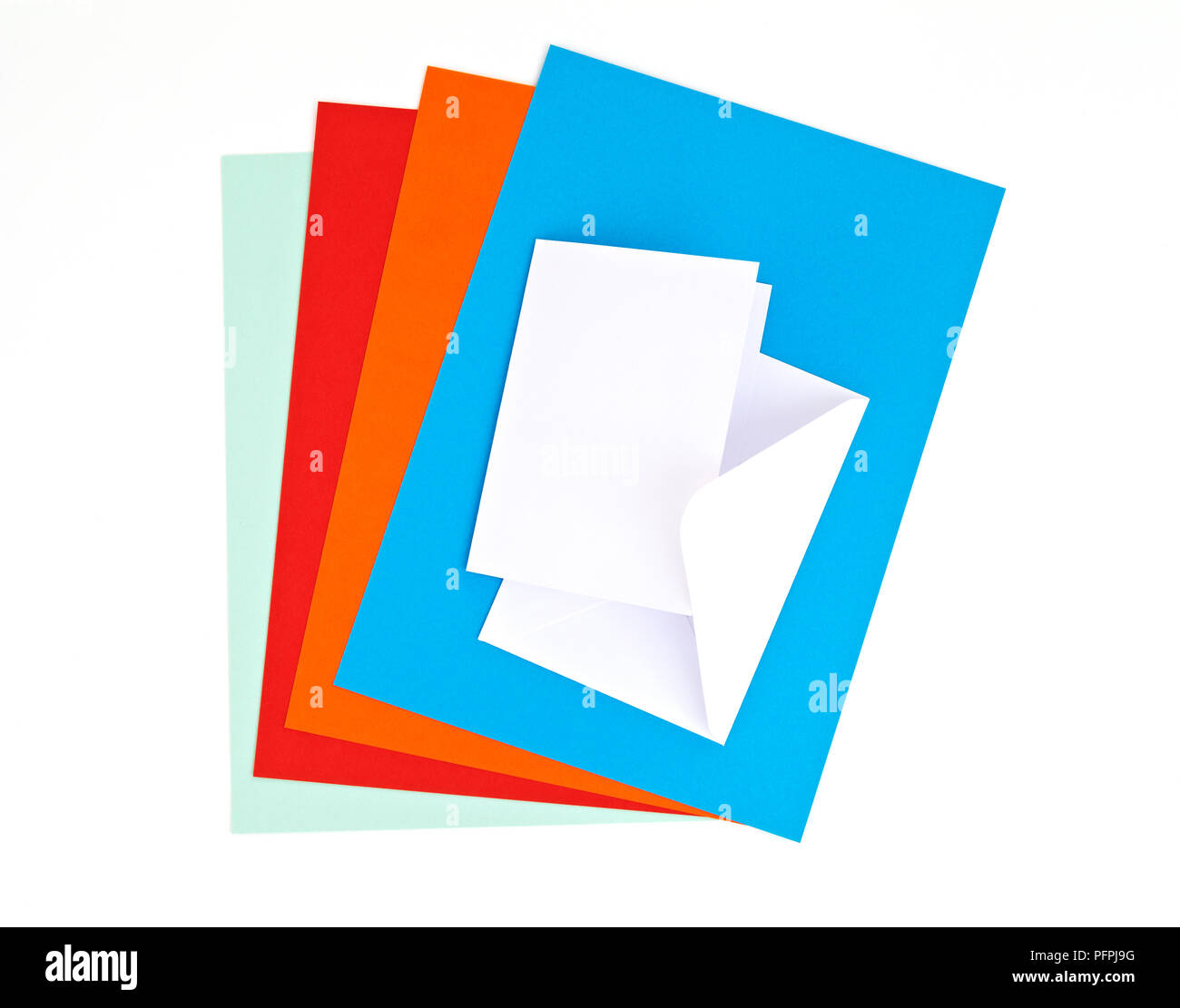 Coloured card and and envelope Stock Photo