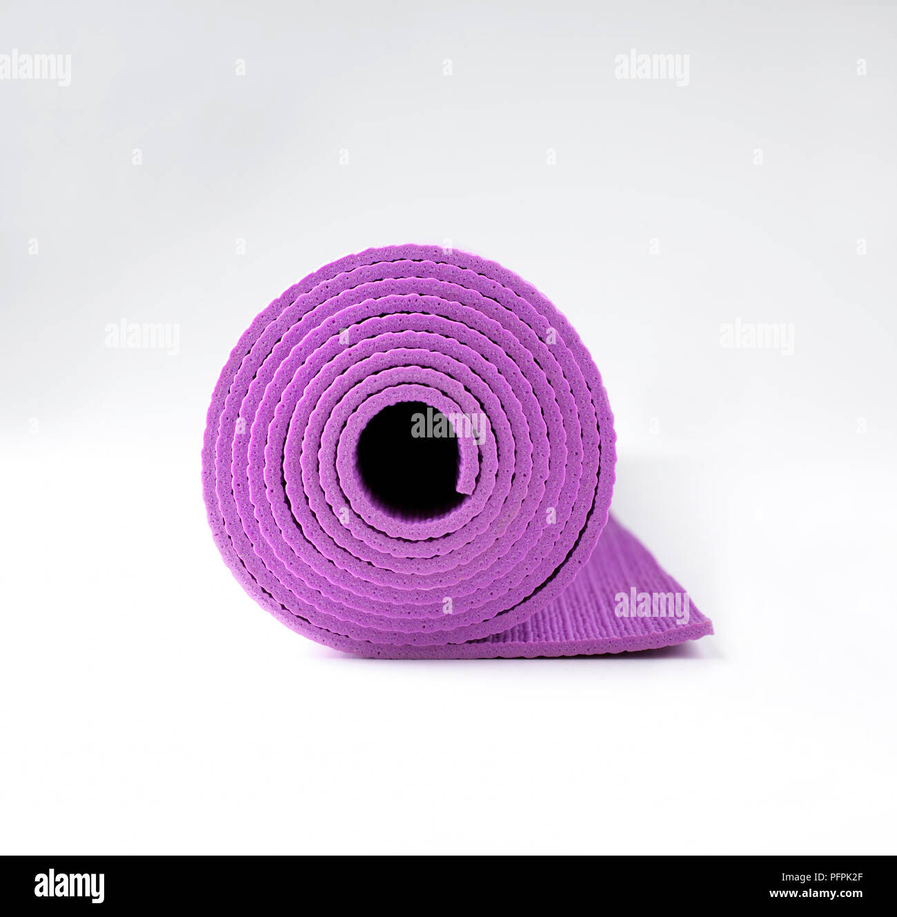 Rolled up pink mat Stock Photo