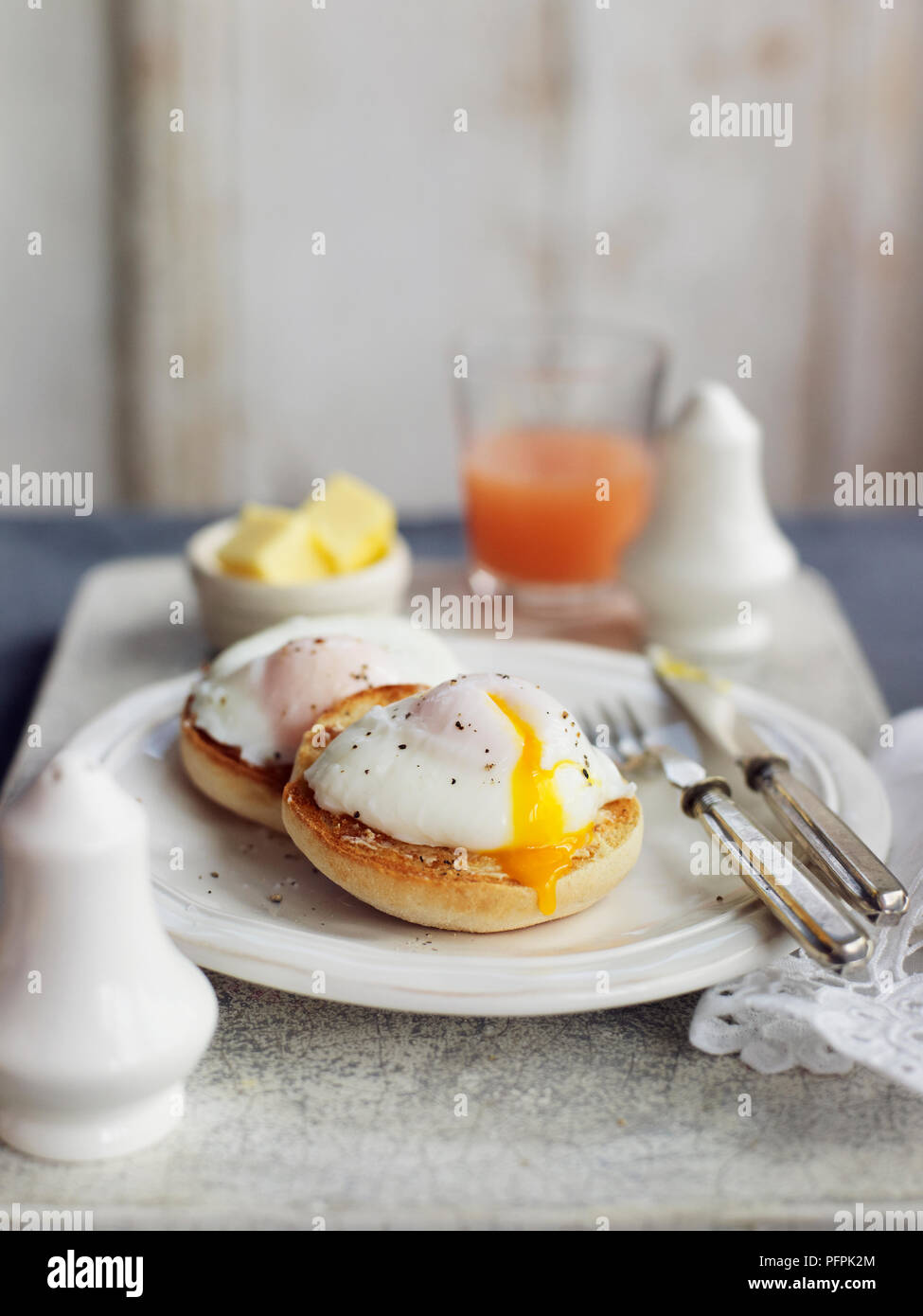 Poached egg on English muffin Stock Photo