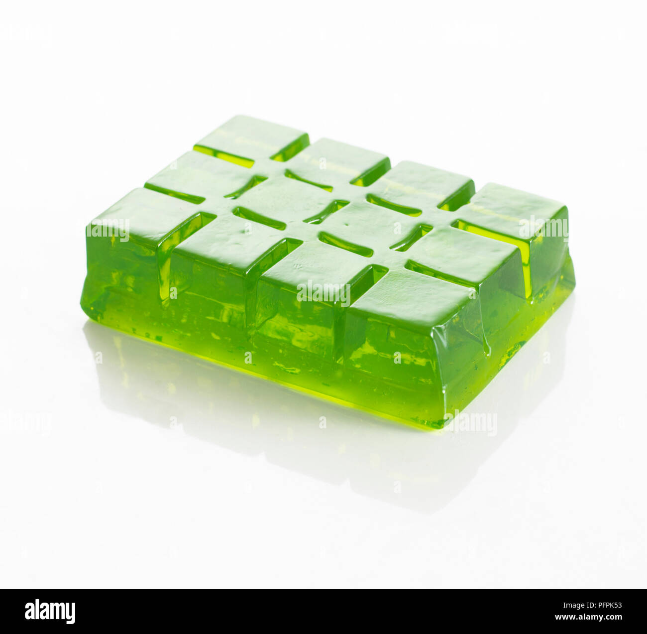 Block of set green jelly (made using ice cube tray) Stock Photo