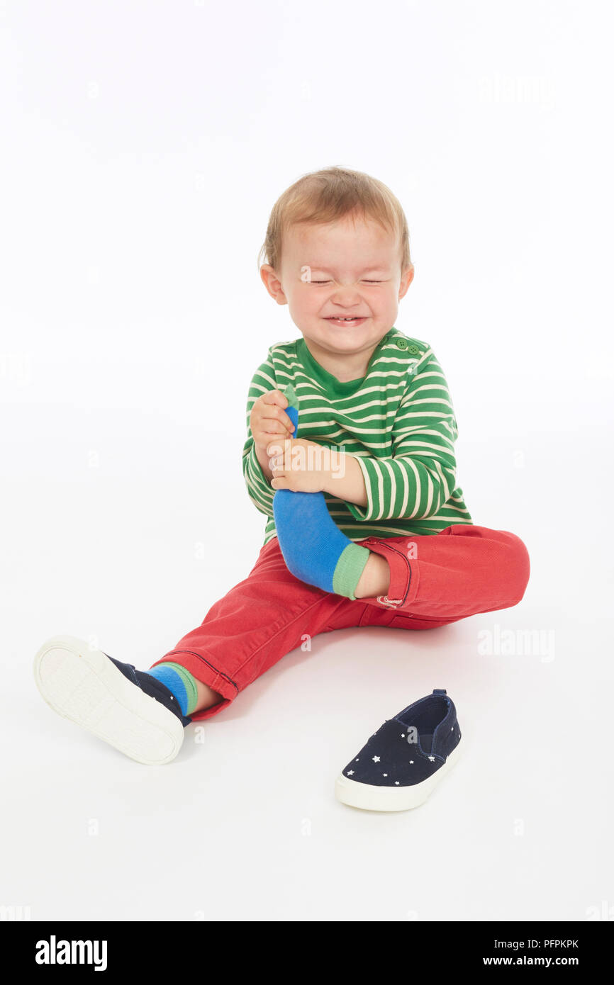 Taking off socks hires stock photography and images Alamy