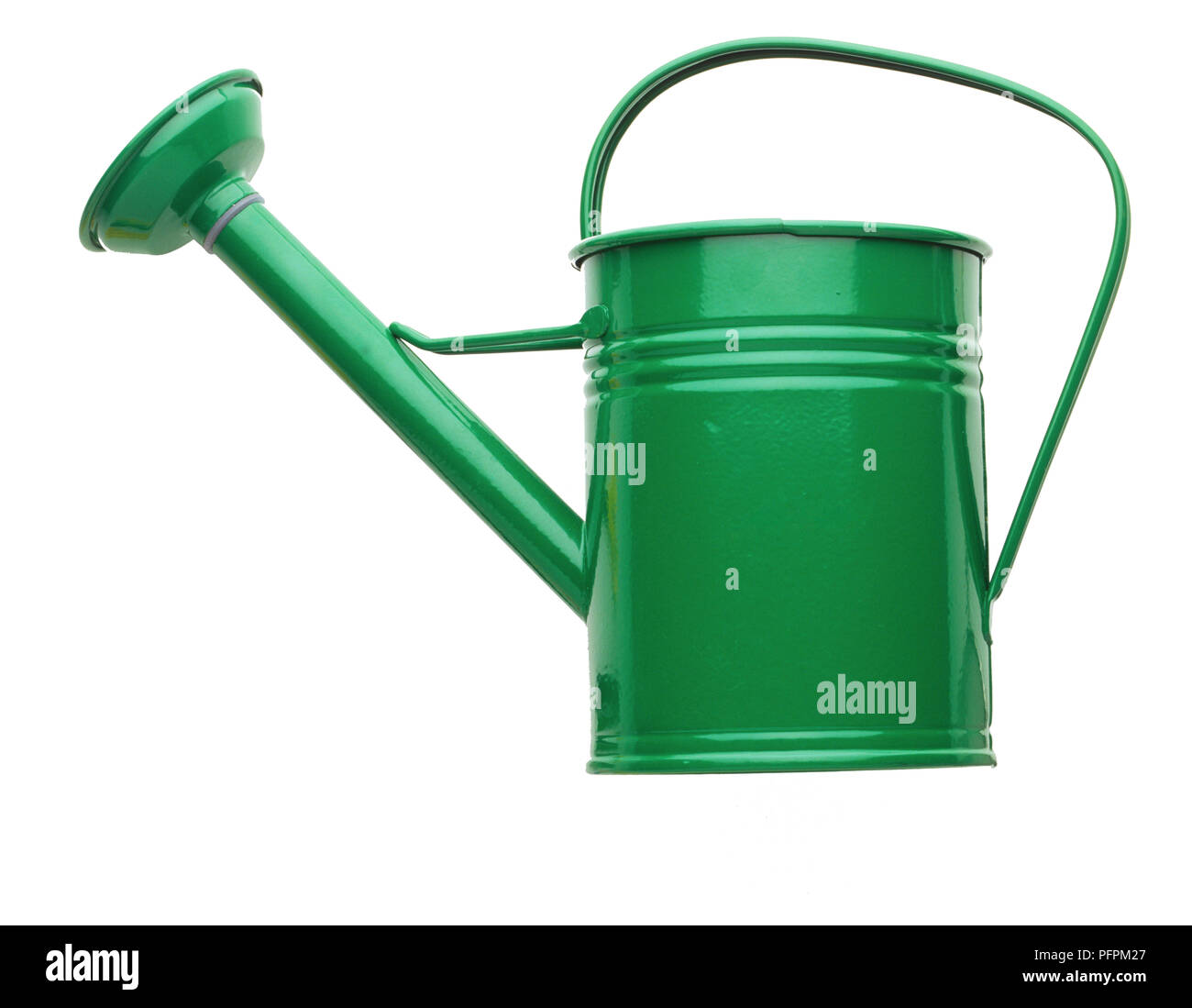 Green metal watering can, side view Stock Photo