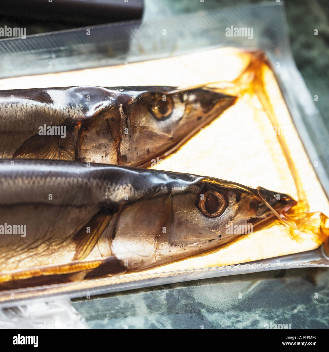 Sea fish saury in vacuum packaging Stock Photo Alamy