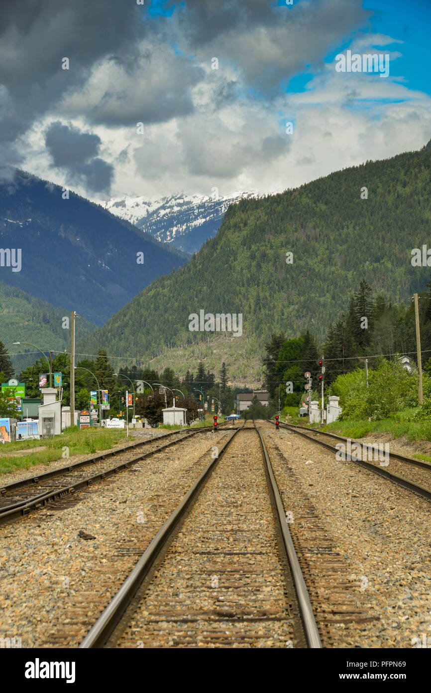 Wide angle view of the railway tracks at Revelstoke in British Columbia Stock Photo