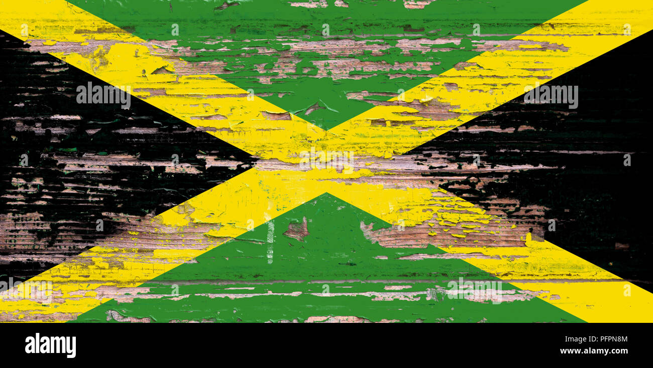 National flag of Jamaica  on a dull wooden background Stock Photo