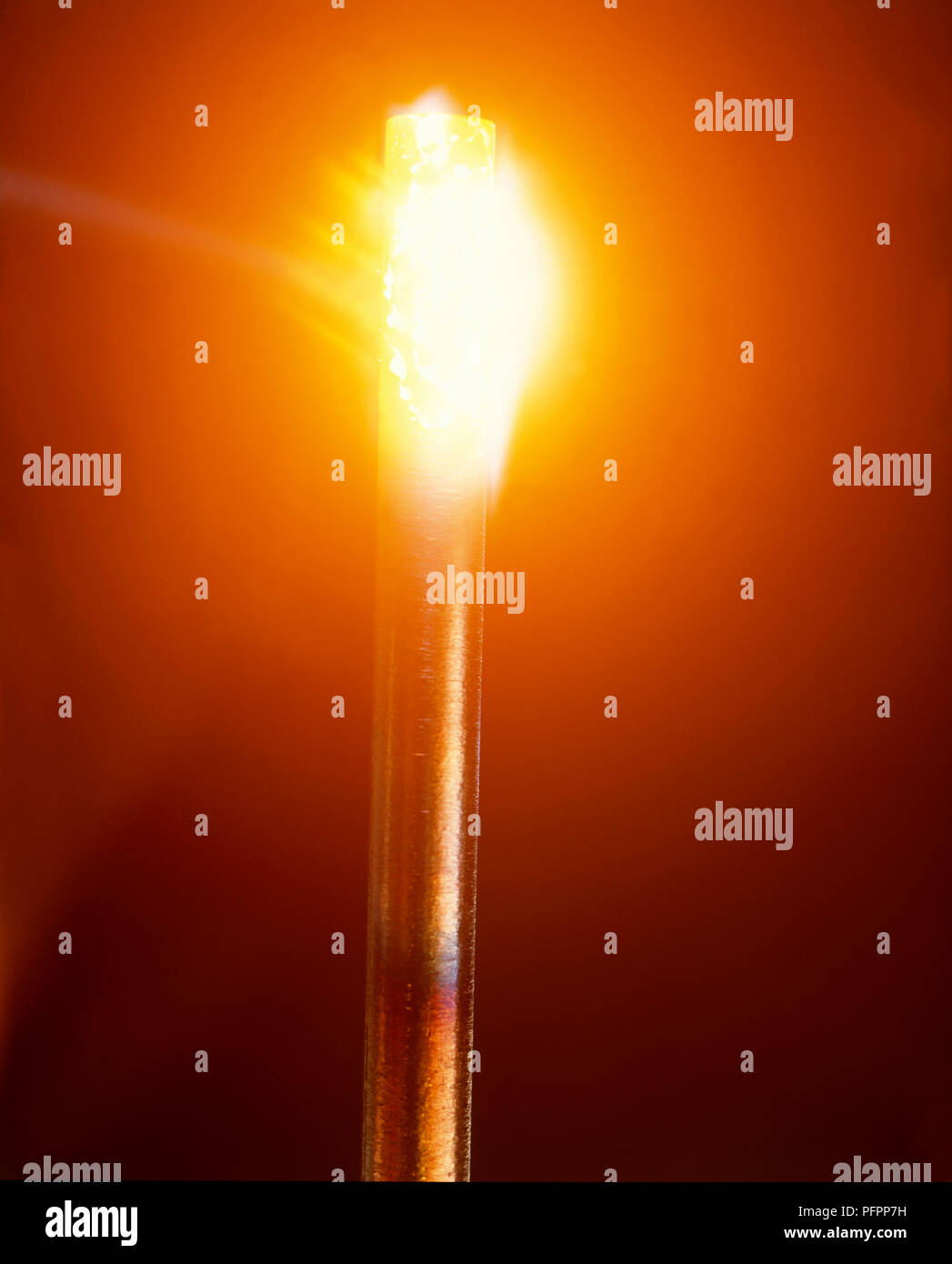 Intensely hot iron bar glowing white Stock Photo Alamy