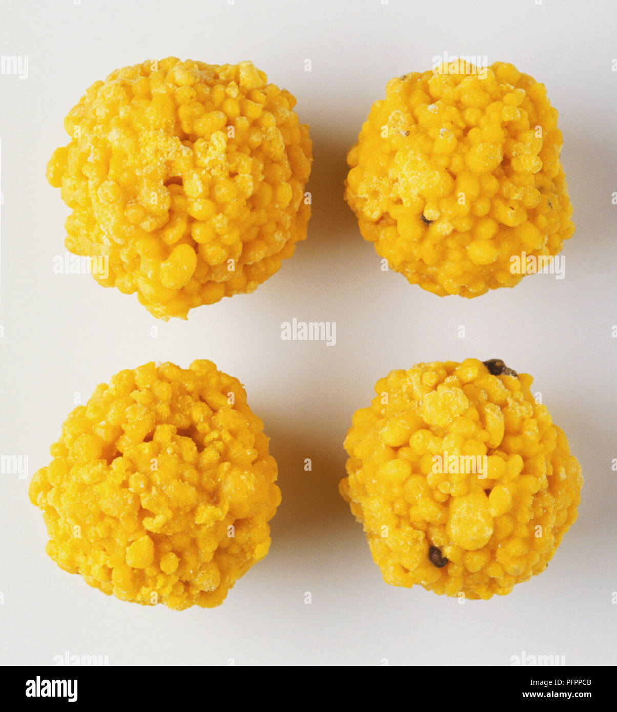 Laddu, four Indian sweets, made from chickpea flour Stock Photo Alamy